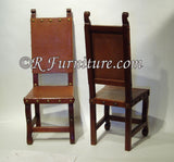 Spanish Colonial style leather side chairs with a chestnut finish, upholstered in brown leather. Spanish style furniture