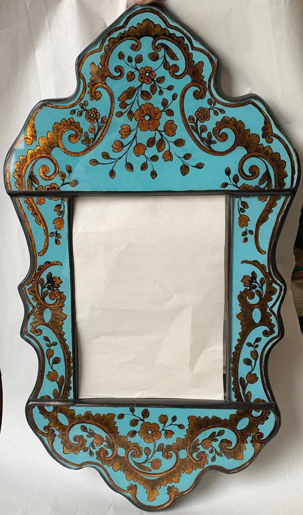 Reverse painted glass mirror Isabellina Turquoise with Gold details and flowers. 17 1/2"H x 10"W. Handmade in Peru.  Includes mirror