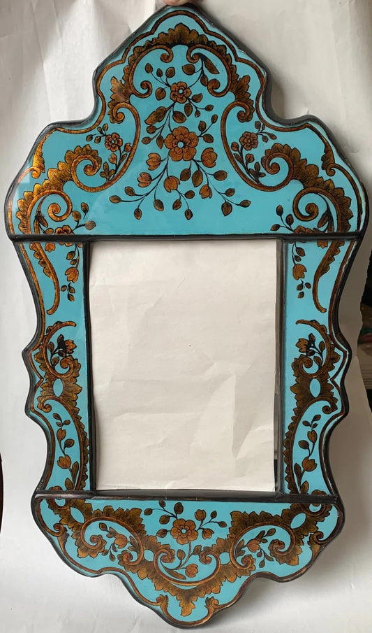 Reverse painted glass mirror Isabellina Turquoise with Gold details and flowers. 17 1/2"H x 10"W. Handmade in Peru.  Includes mirror