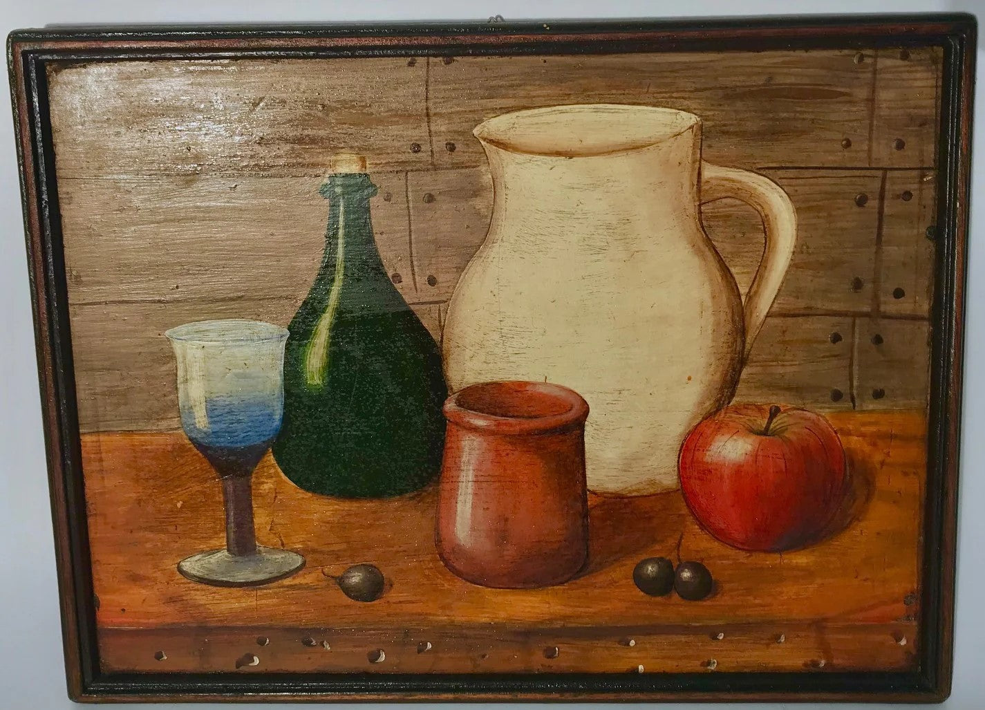 A painting depicting a still life arrangement of a glass, pitcher, bottle, apple, and capulis on a wooden table.